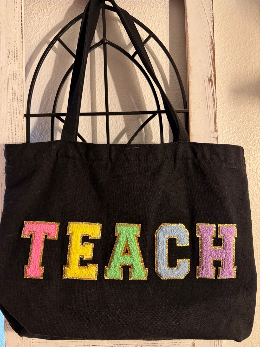 Black 'TEACH' Multicolor Glitter Patch Letter Tote Bag